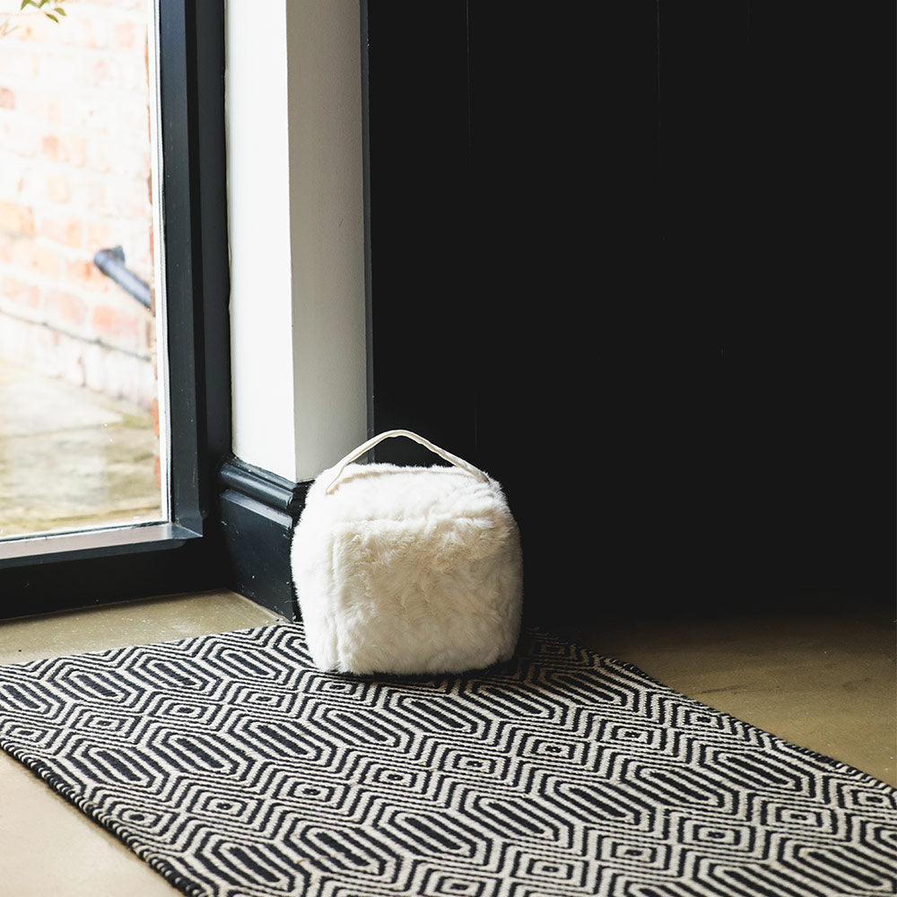 Plush Faux Fur Door Stop in Ecru