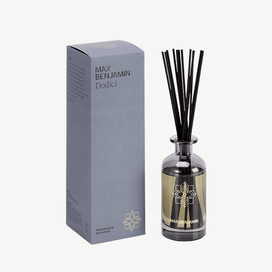 Scented diffuser in smoked glass with matching diffuser sticks