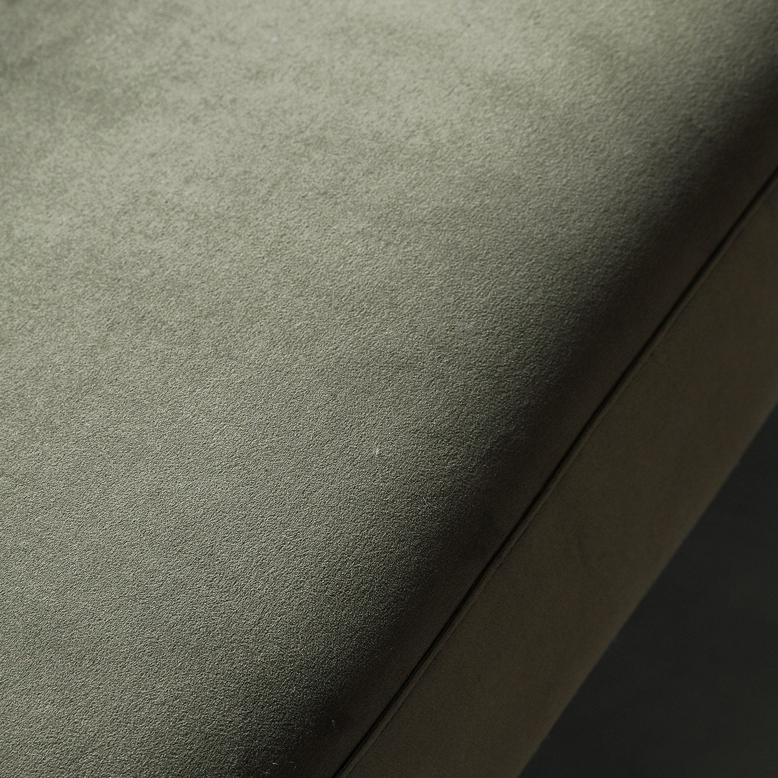 Contemporary curved 2 seater sofa in moss green fabric