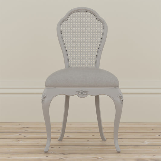 Grey upholstered chair with a cushioned seat and backrest
