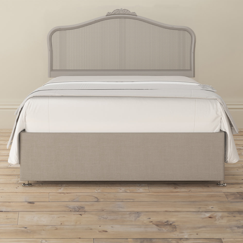 Chic grey rattan headboard with intricate detailing
