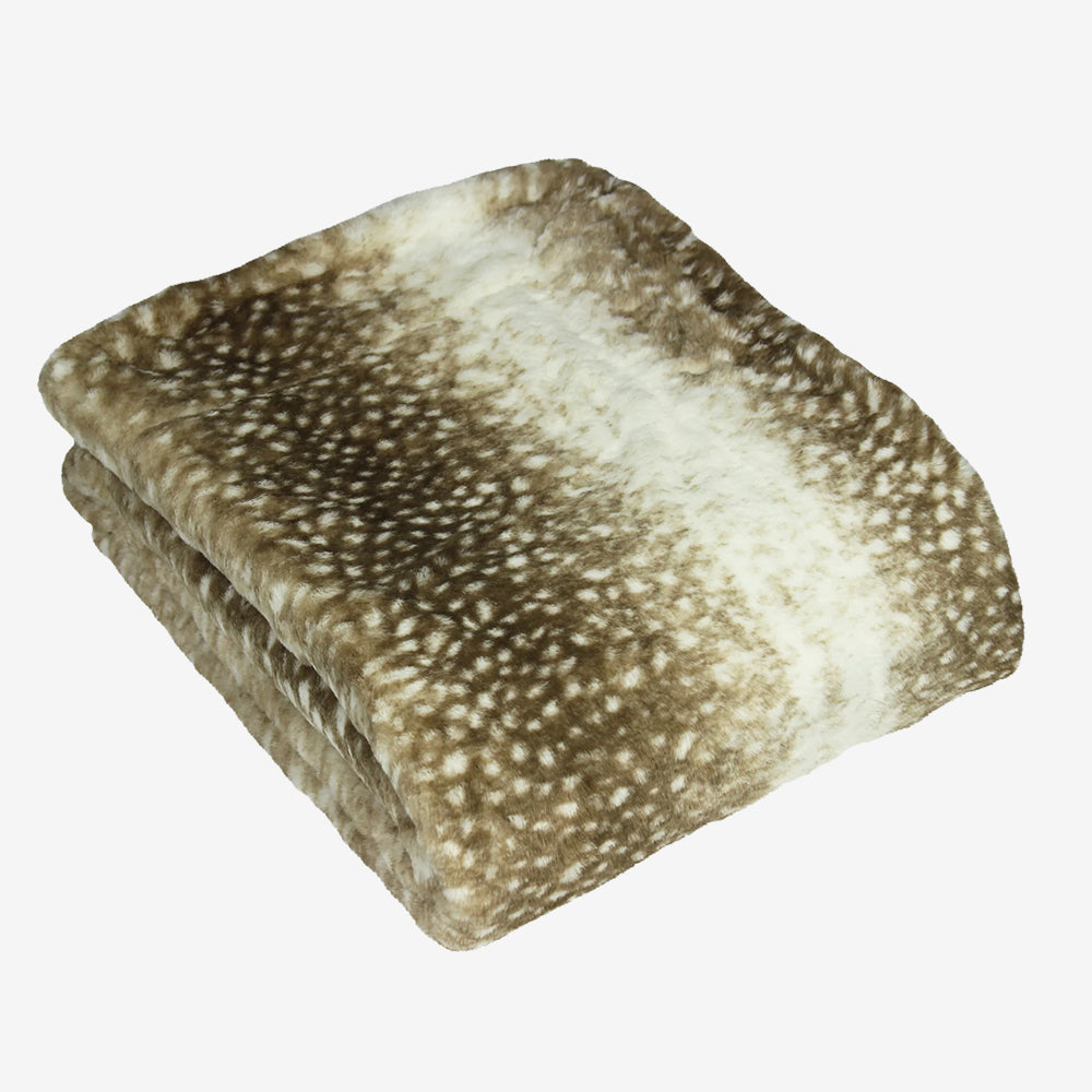 Folded blanket with a pattern on a white background
