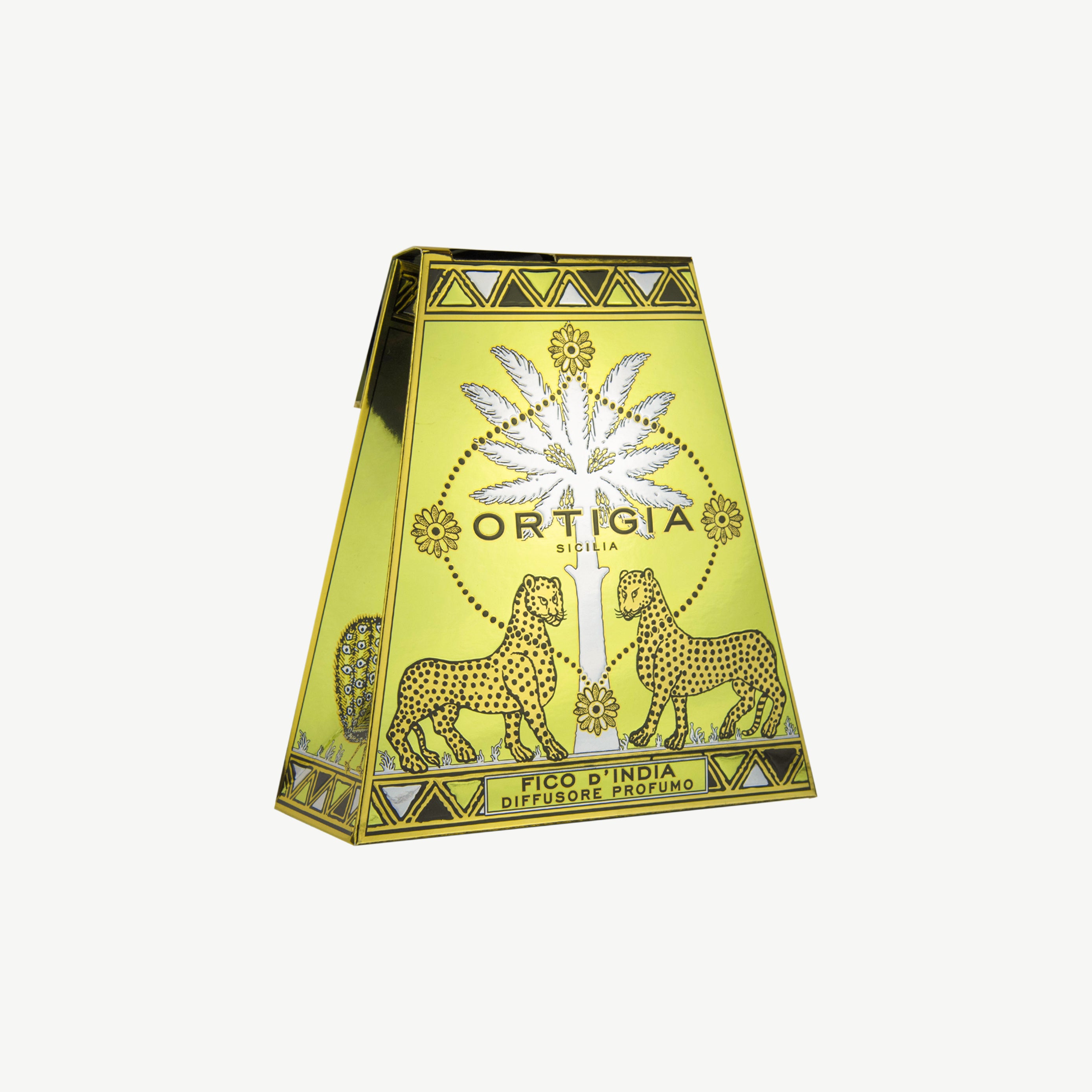 Ortigia Fico dIndia diffuser housed in ornate yellow tinted glass bottle with accompanying diffuser reeds
