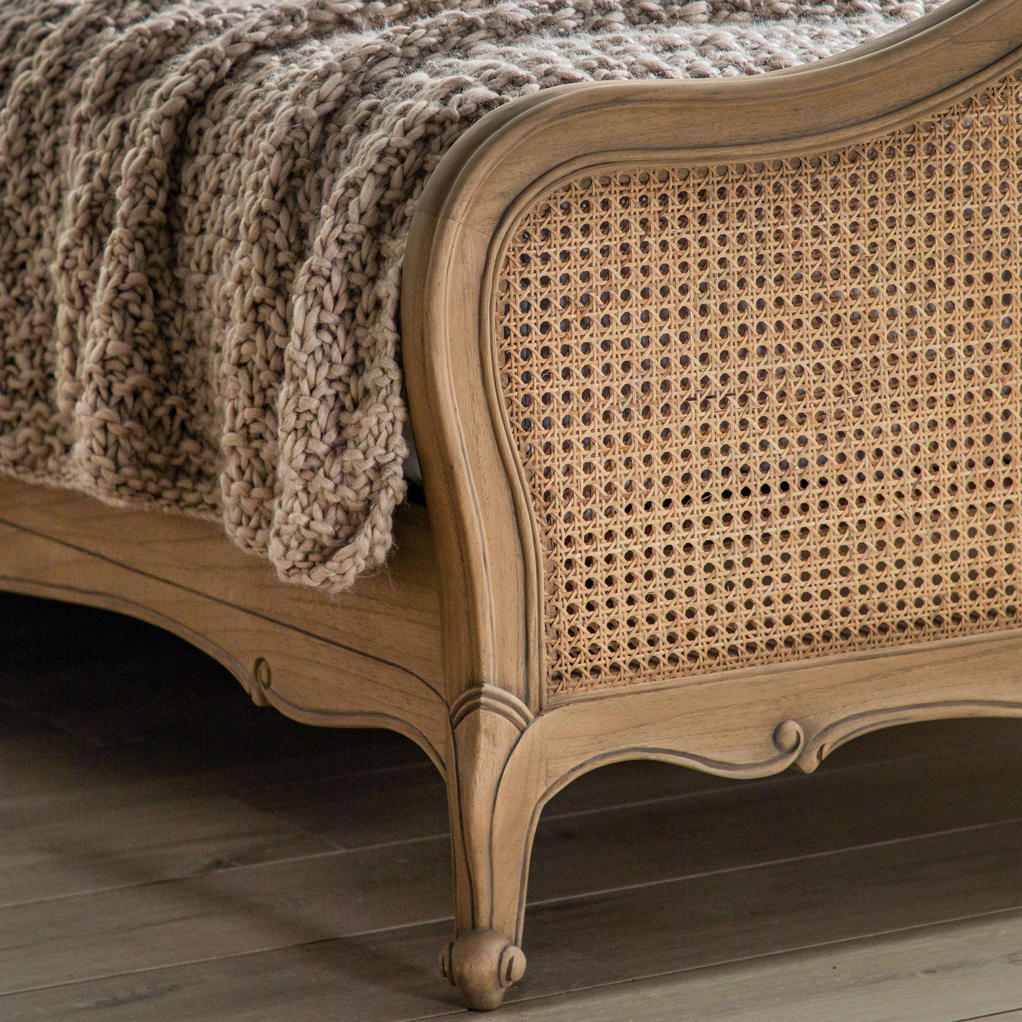 Mindy ash king sized bed in weathered cane finish with dovetailed joints and hand carved sections