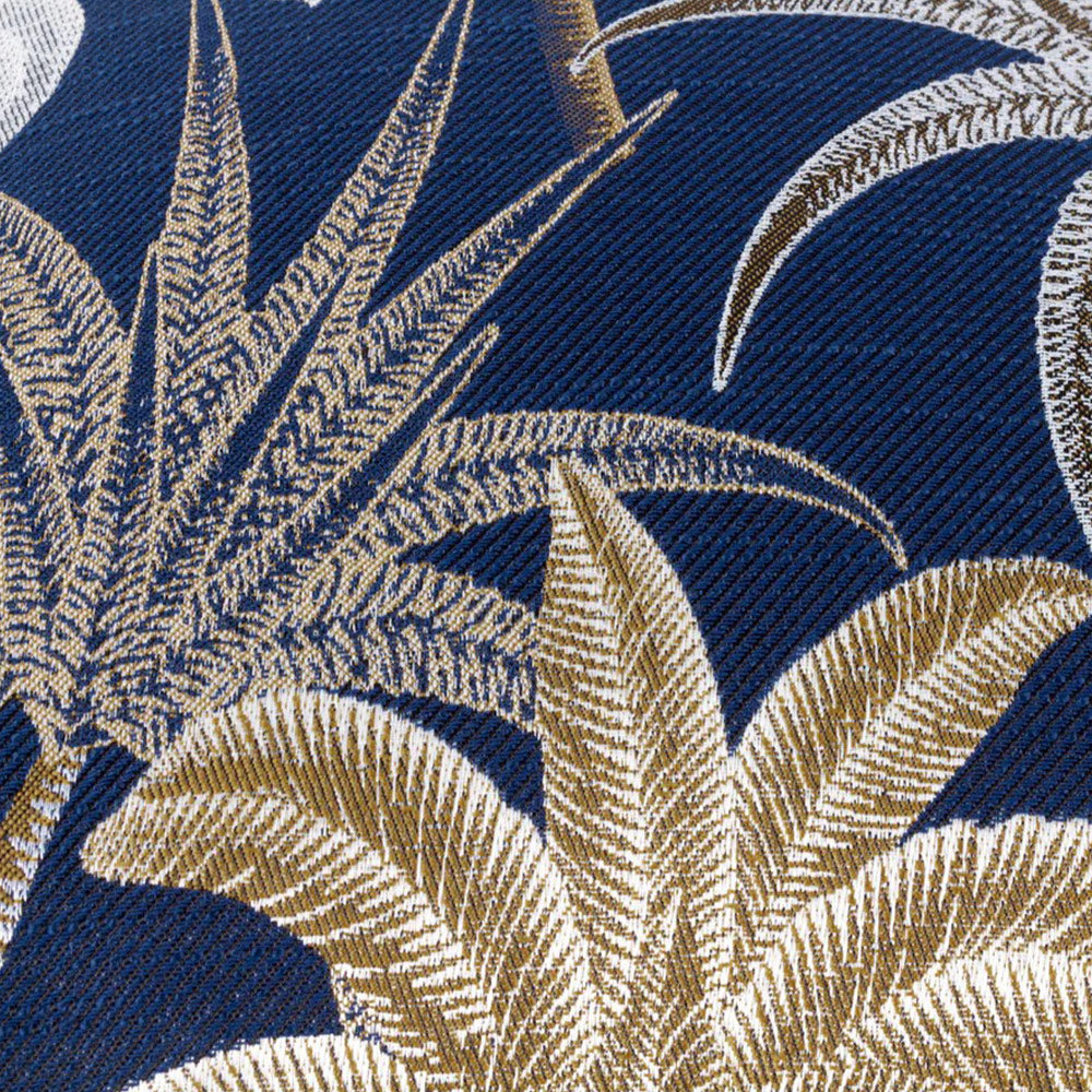 Exotic palm leaf print scatter cushion in blue, gold and white