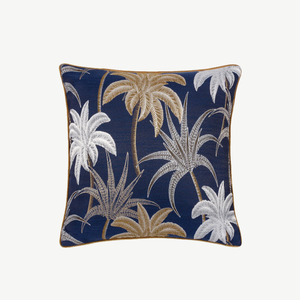 Exotic palm leaf print scatter cushion in blue, gold and white