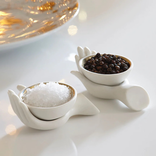 White matte porcelain salt and pepper cellars with gold interior
