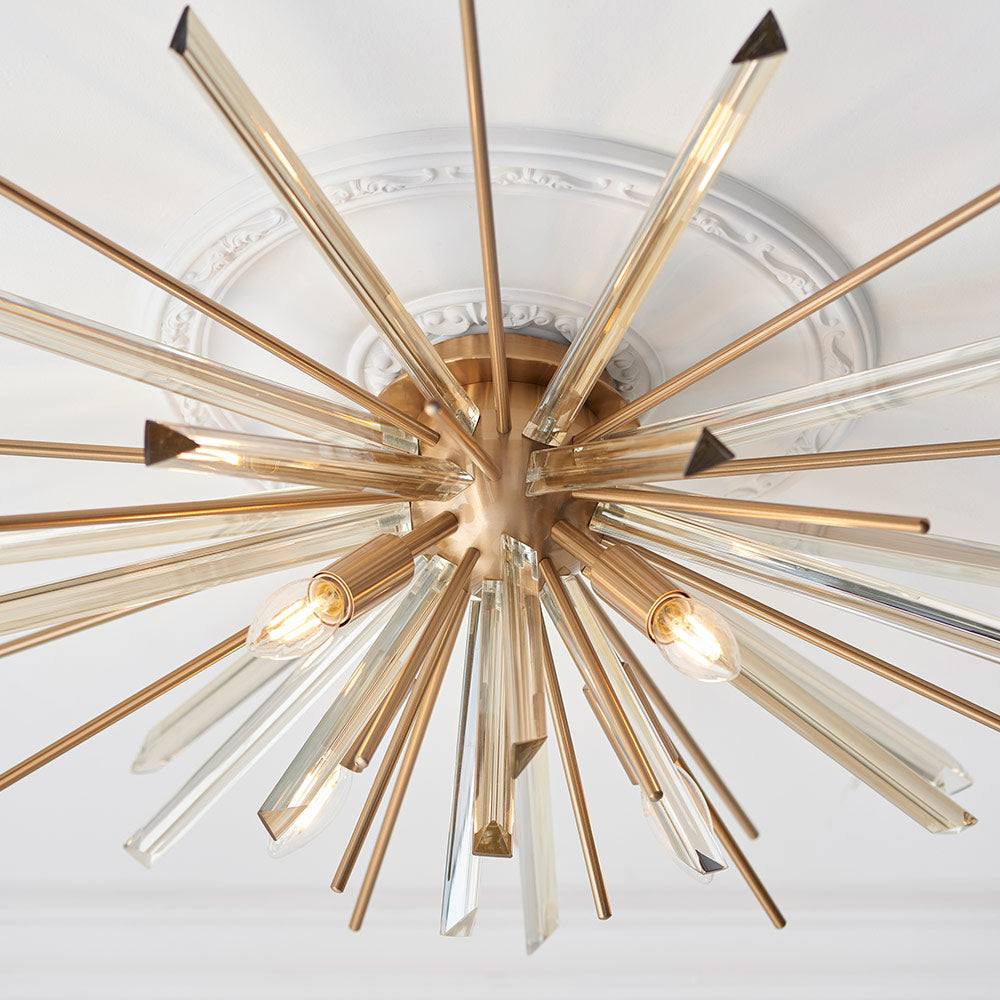 Flush light with antique brass metalwork, champagne triangular prism glass and decorative rods