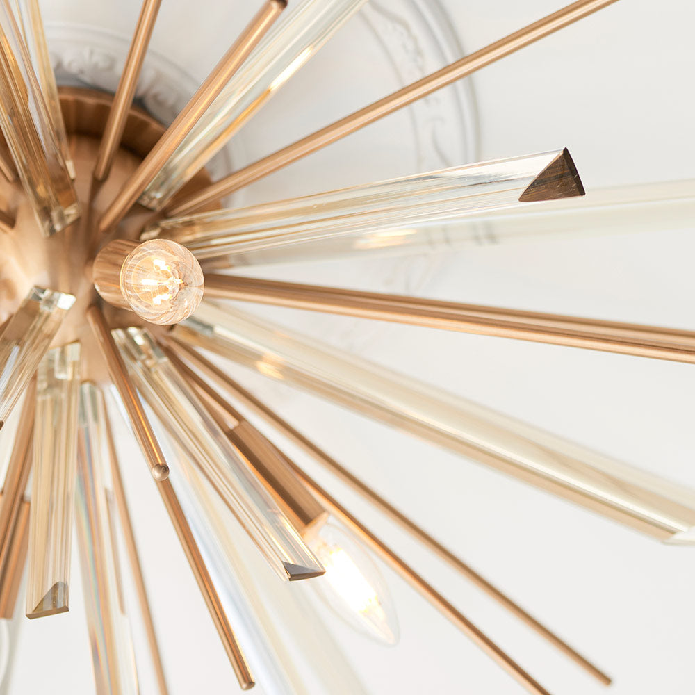 Flush light with antique brass metalwork, champagne triangular prism glass and decorative rods
