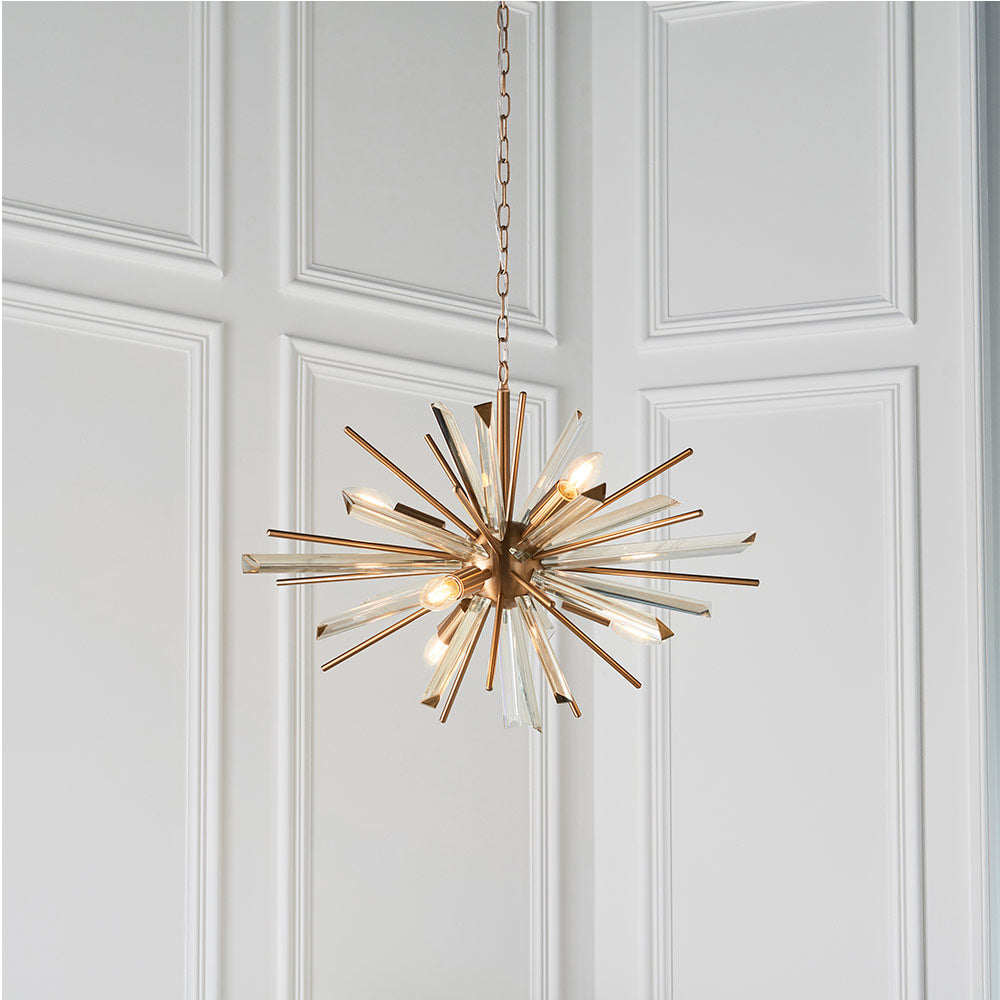 Brass pendant with champagne triangular prism glass and decorative rods