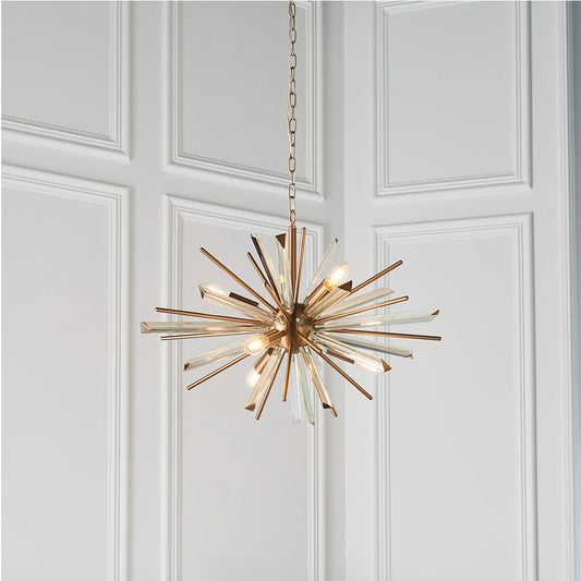Brass pendant with champagne triangular prism glass and decorative rods