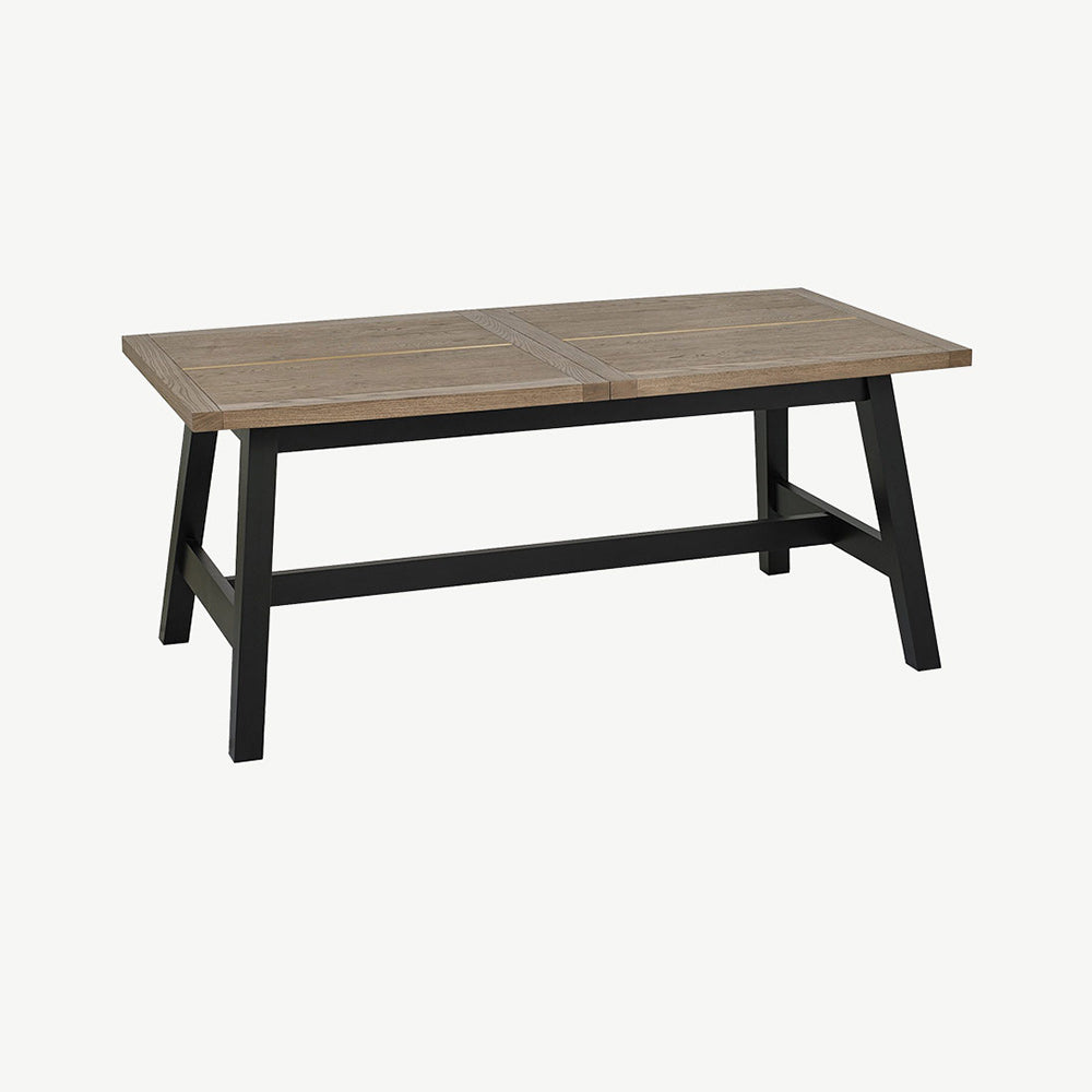 Oak veneer extending dining table with black peppercorn solid ash legs