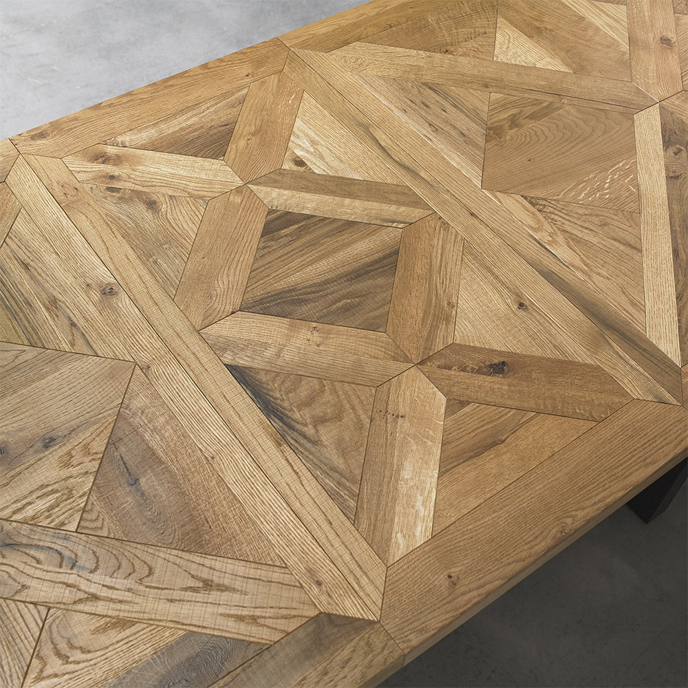 Oak veneer extending dining table with black powder coated metal base
