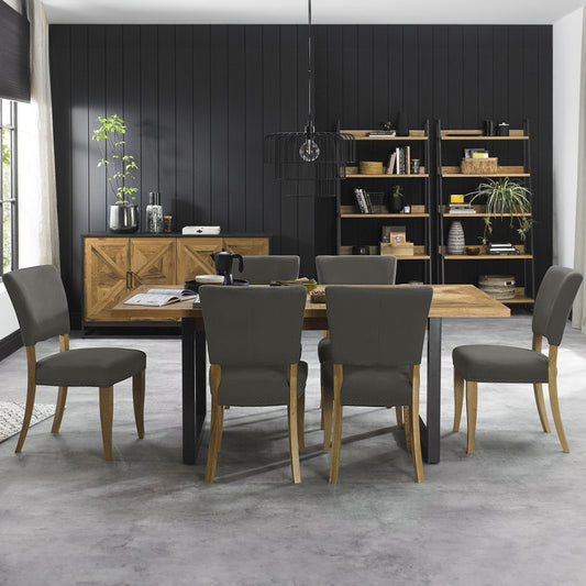 Oak veneer extending dining table with black powder coated metal base
