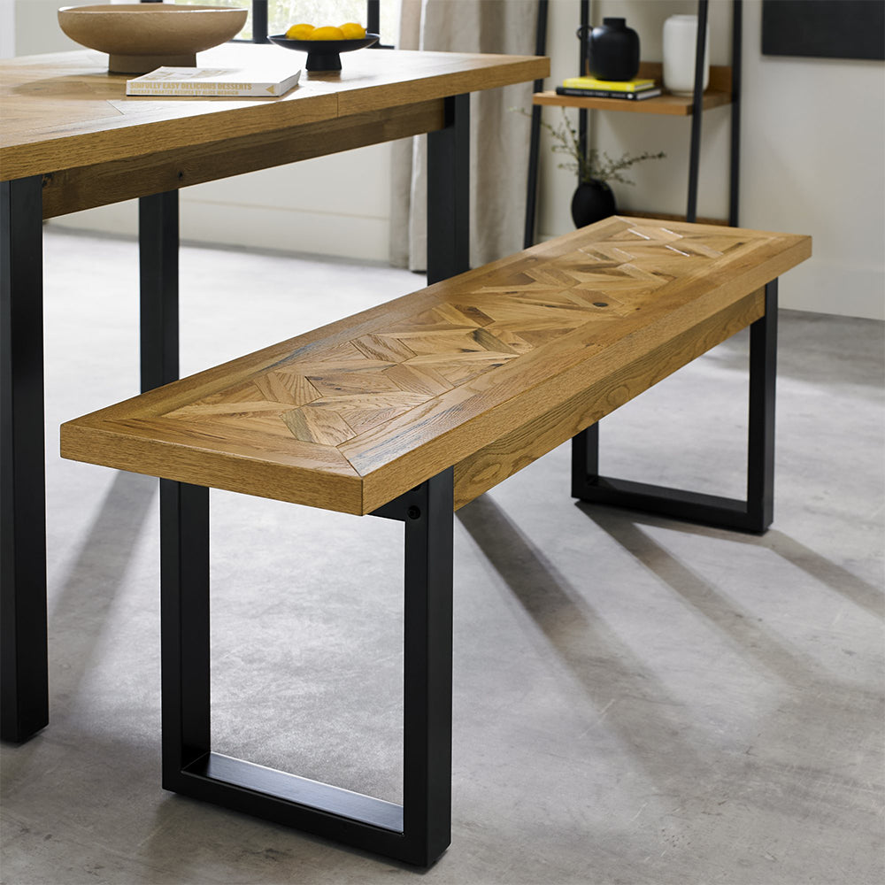 Oak veneer bench with black powder coated metal base
