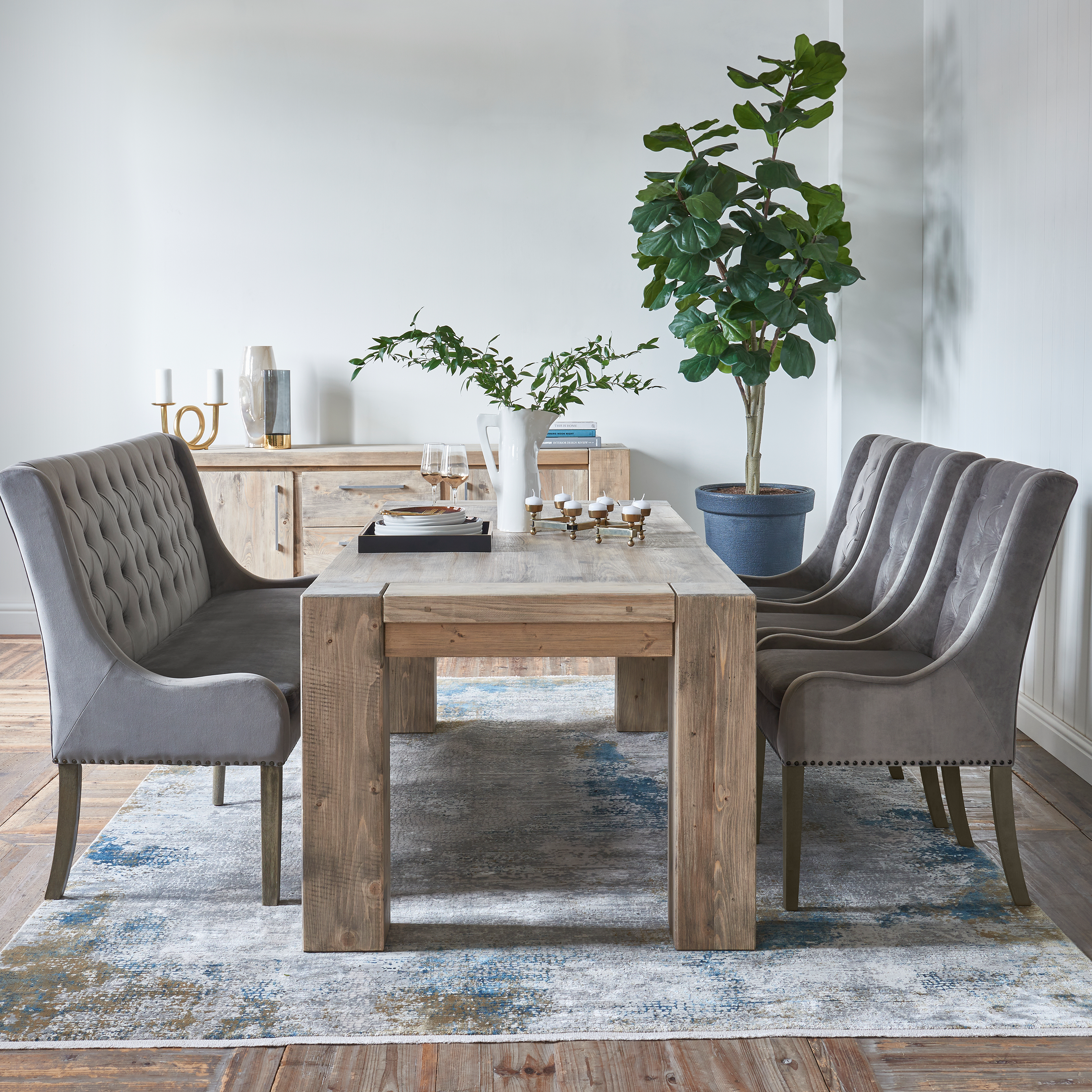 Wood dining table in natural finish