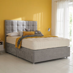 Luxury white mattress on light grey bedframe
