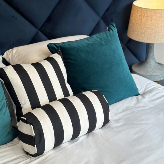 Black and white striped bolster cushion