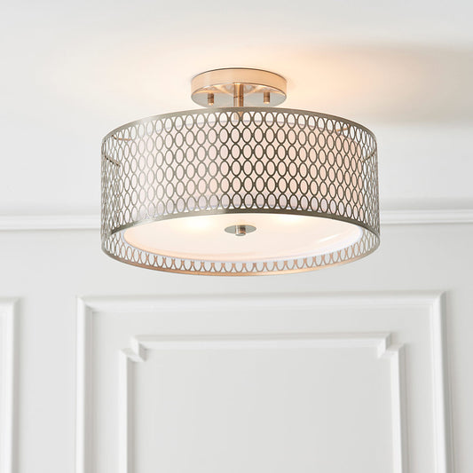 A simple, round flush-mounted ceiling light with a clean, minimalist design, typically providing even, diffused lighting.
