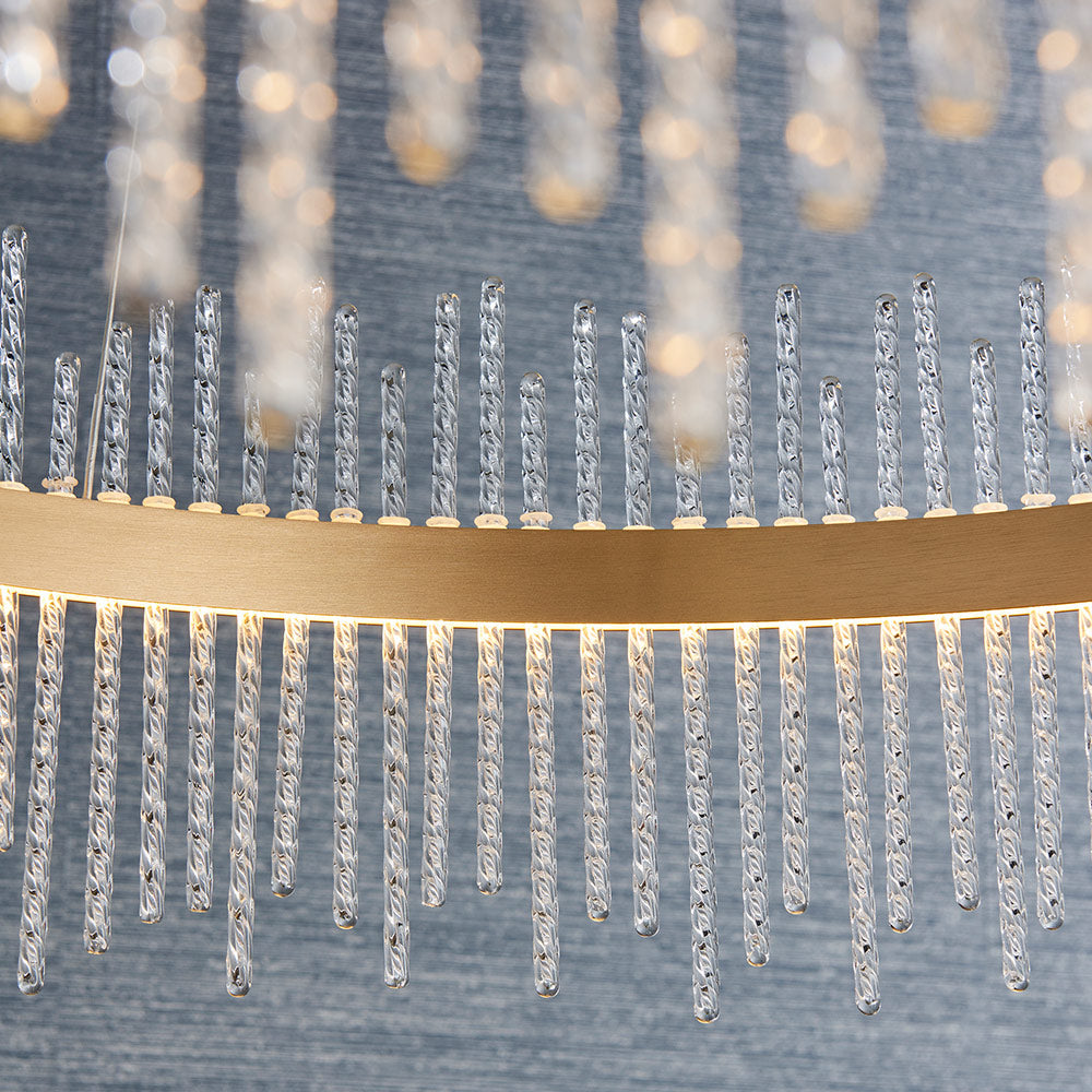 Brushed gold plated pendant with twisted clear glass rods