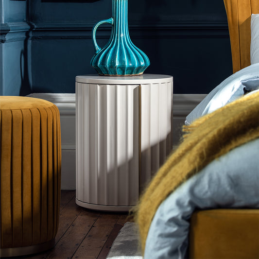 Mahogany right bedside table in netural ivory finish with corrugated front and gold accent handle