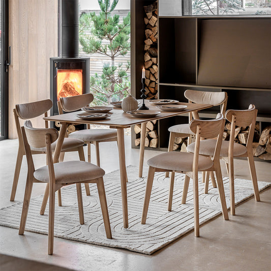 Rectangular wooden dining table in natural oak finish