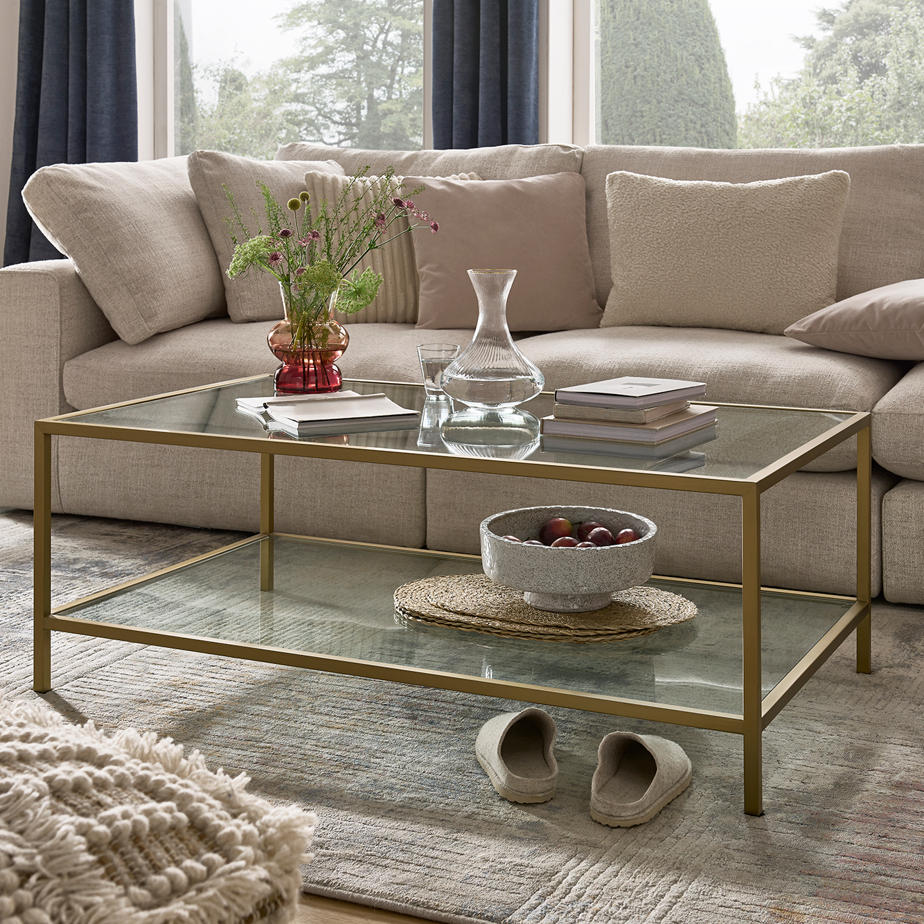 Champagne brass coffee table with glass top