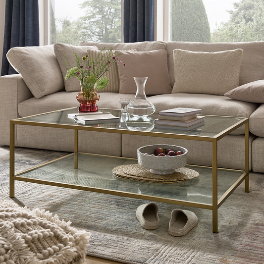 Champagne brass coffee table with glass top