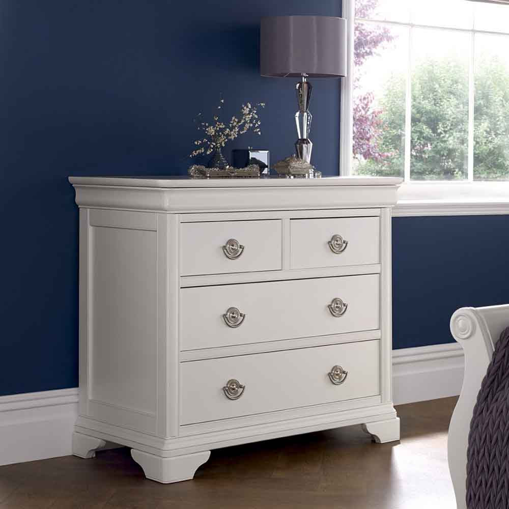 Wooden 2 and 2 drawer chest in painted white finish with silver handles
