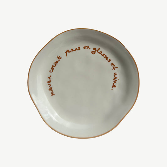 "Never count years or glasses of wine" Orange Decorative Plate