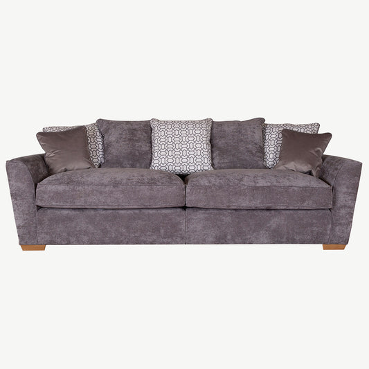4 seater sofa upholstered in soft grey fabric with natural wooden legs