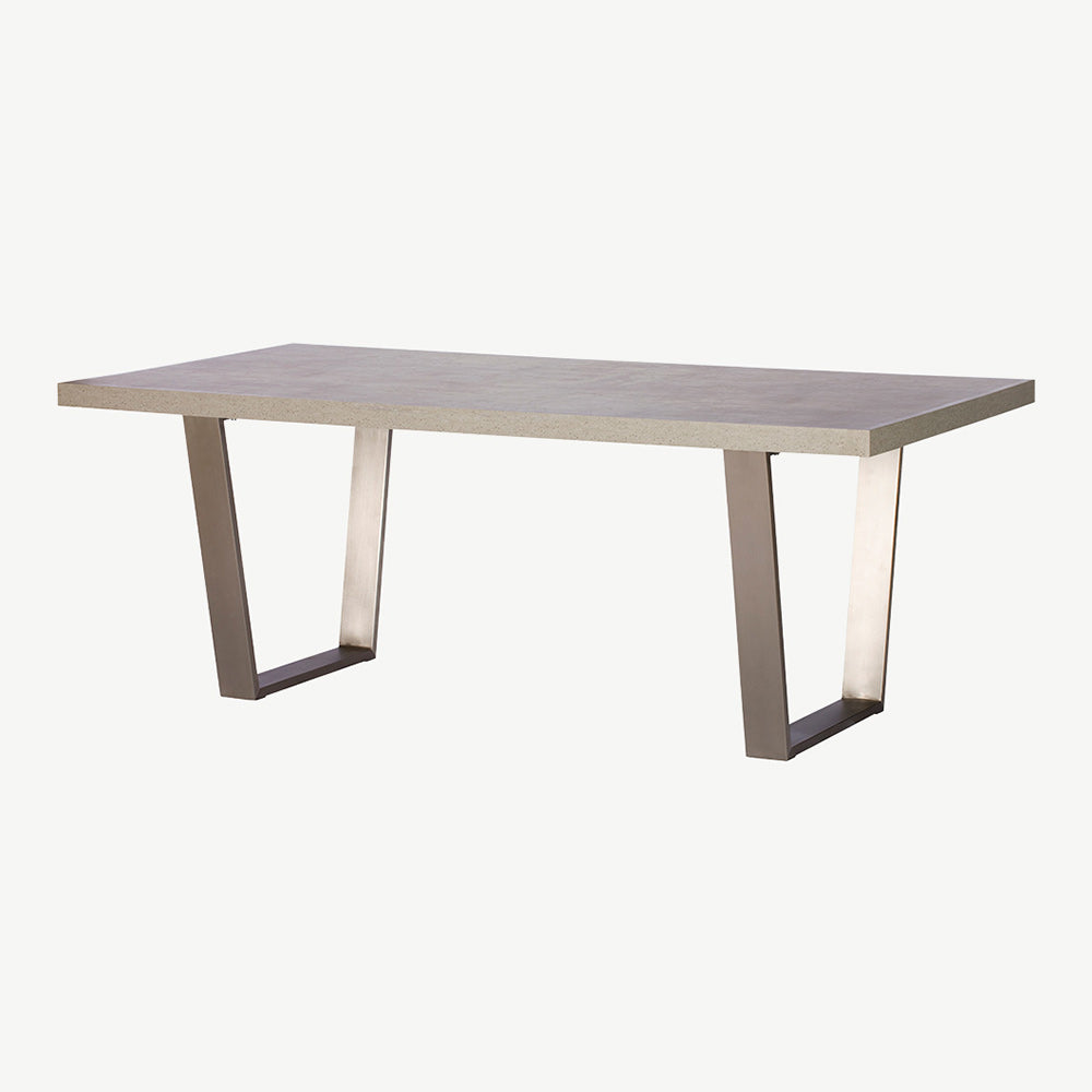 Solid stone effect grey toned rectangular dining table set upon modern angular legs
