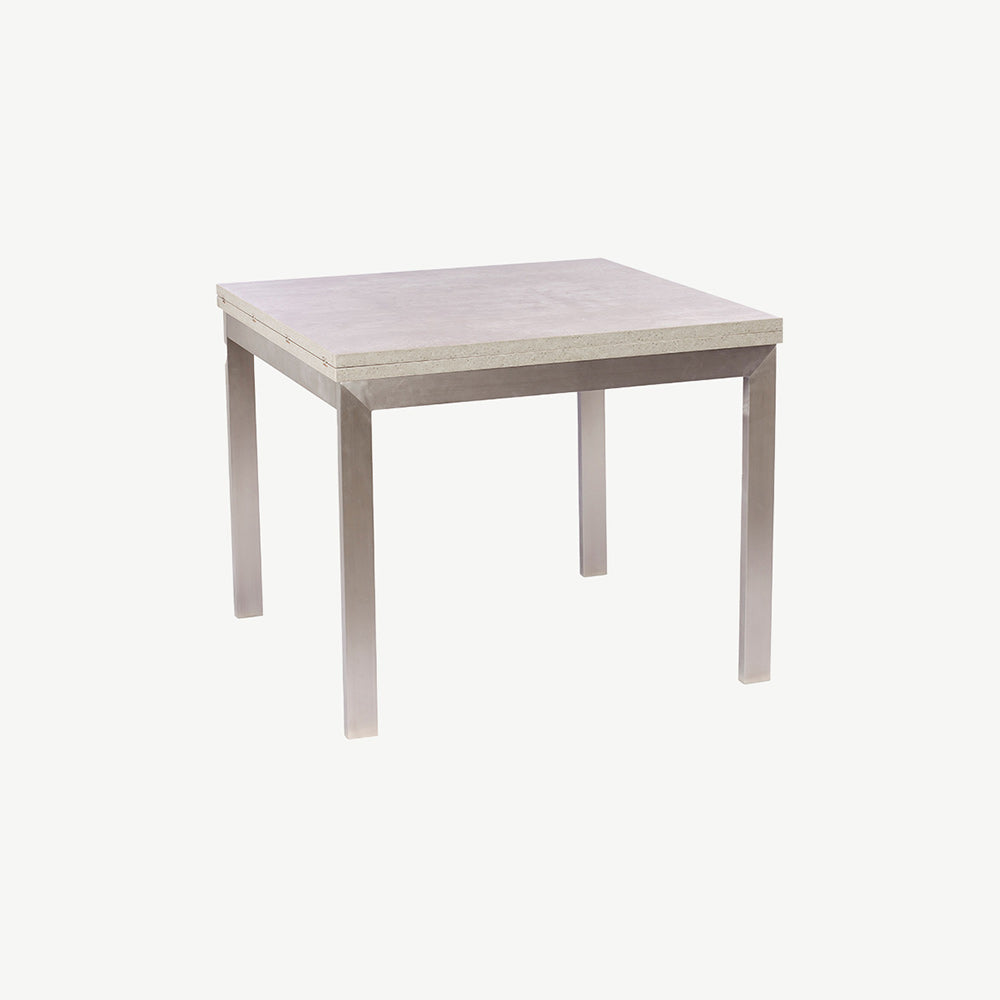 Neutral grey toned dining table with stainless steel legs
