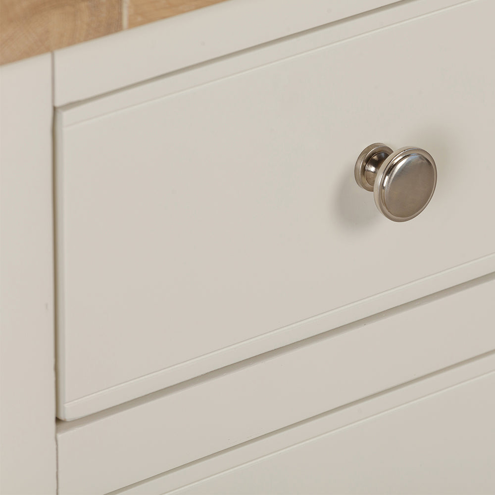 Painted off-white 3 drawer bedside cabinet with natural wood top and three drawers
