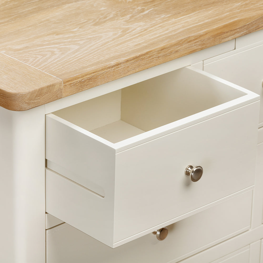 Painted off-white 3 over 4 drawer chest with natural wood top, three top drawers and 4 bottom drawers
