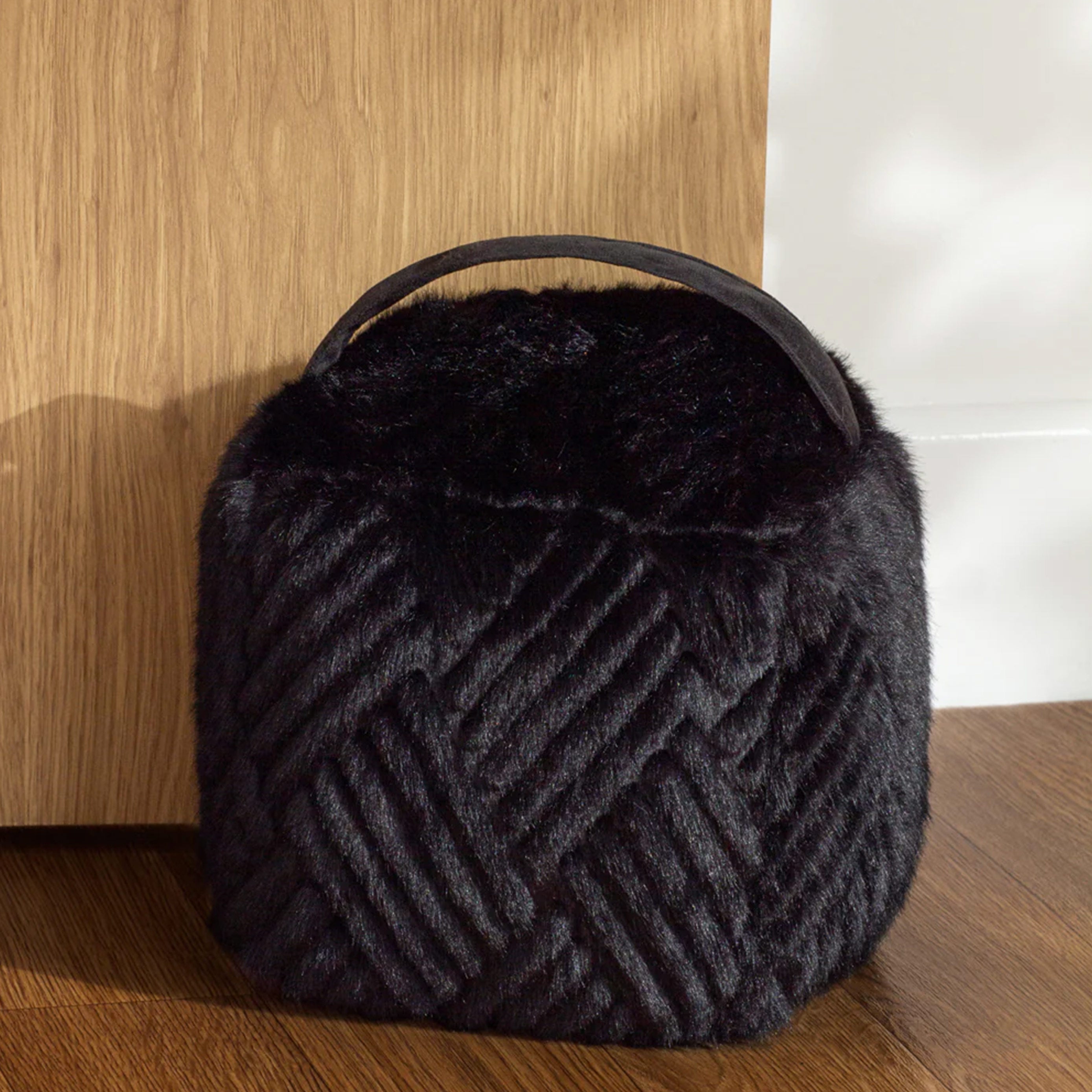 Plush Faux Fur Door Stop in Jet