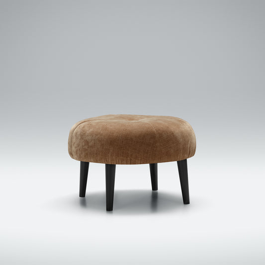 Sits ross footstool featuring cushioned top with elegant stitched and button detailing, tapered wooden legs match the chair