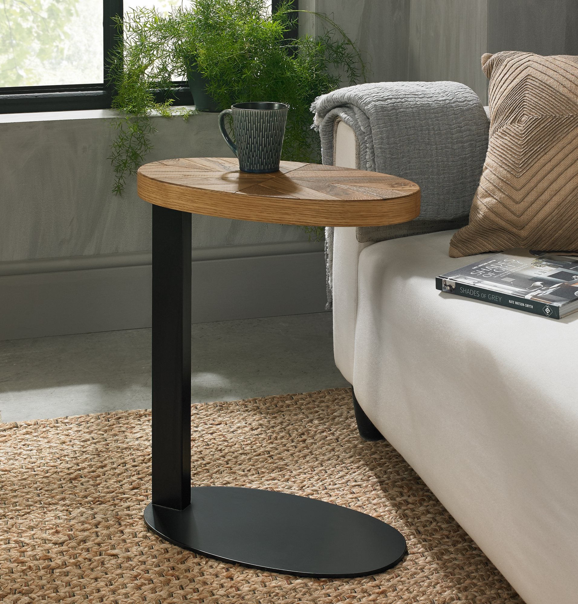 Solid oak sofa table with rustic oak marquetry tops & black powder coated metal base
