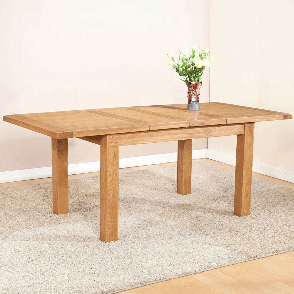 Solid wood extending dining table in natural oak finish