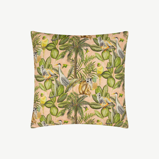 Square fabric scatter cushion with jungle design against soft pink background with neutral off white reverse side