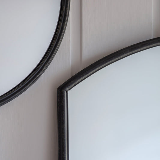 Chic small window mirror in black frame with curved design