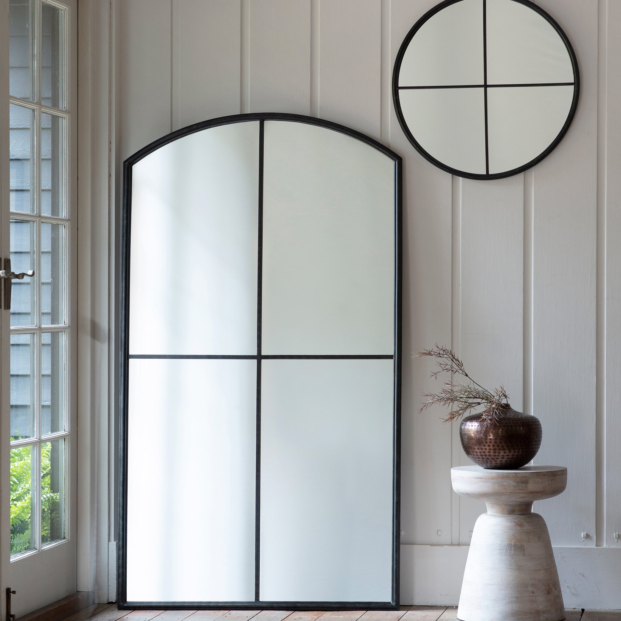 Chic small window mirror in black frame with curved design