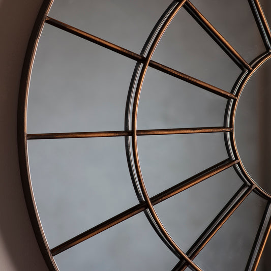 Bronze effect metal frame circular mirror with intricate web design