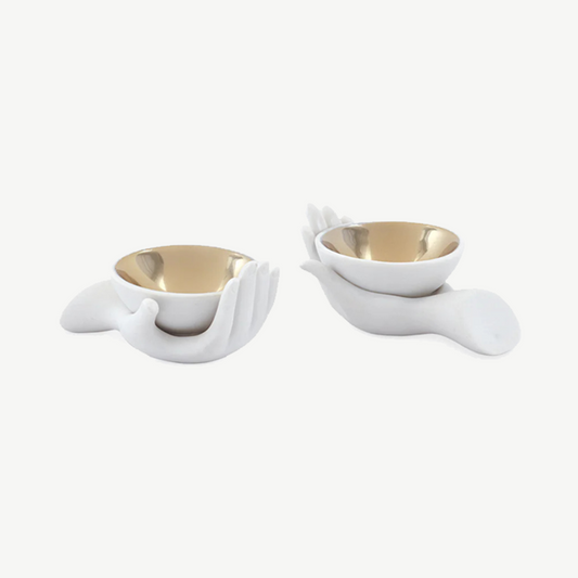 White matte porcelain salt and pepper cellars with gold interior
