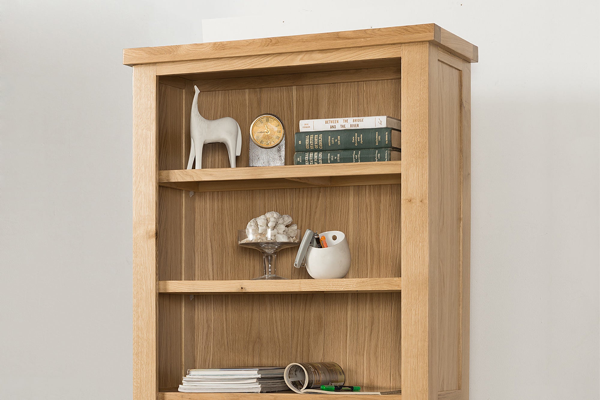 Oak large bookcase in natural finish with six shelves
