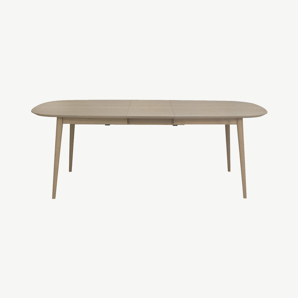 Oak veneer extending dining table with solid beech legs in light oak finish