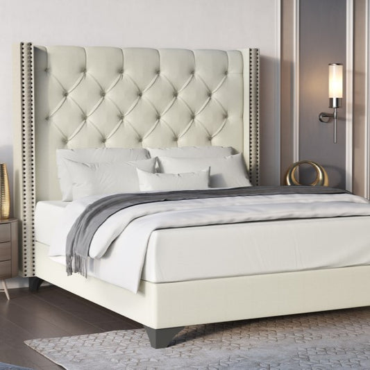 Cream upholstered bedframe with studded headboard and grey feet