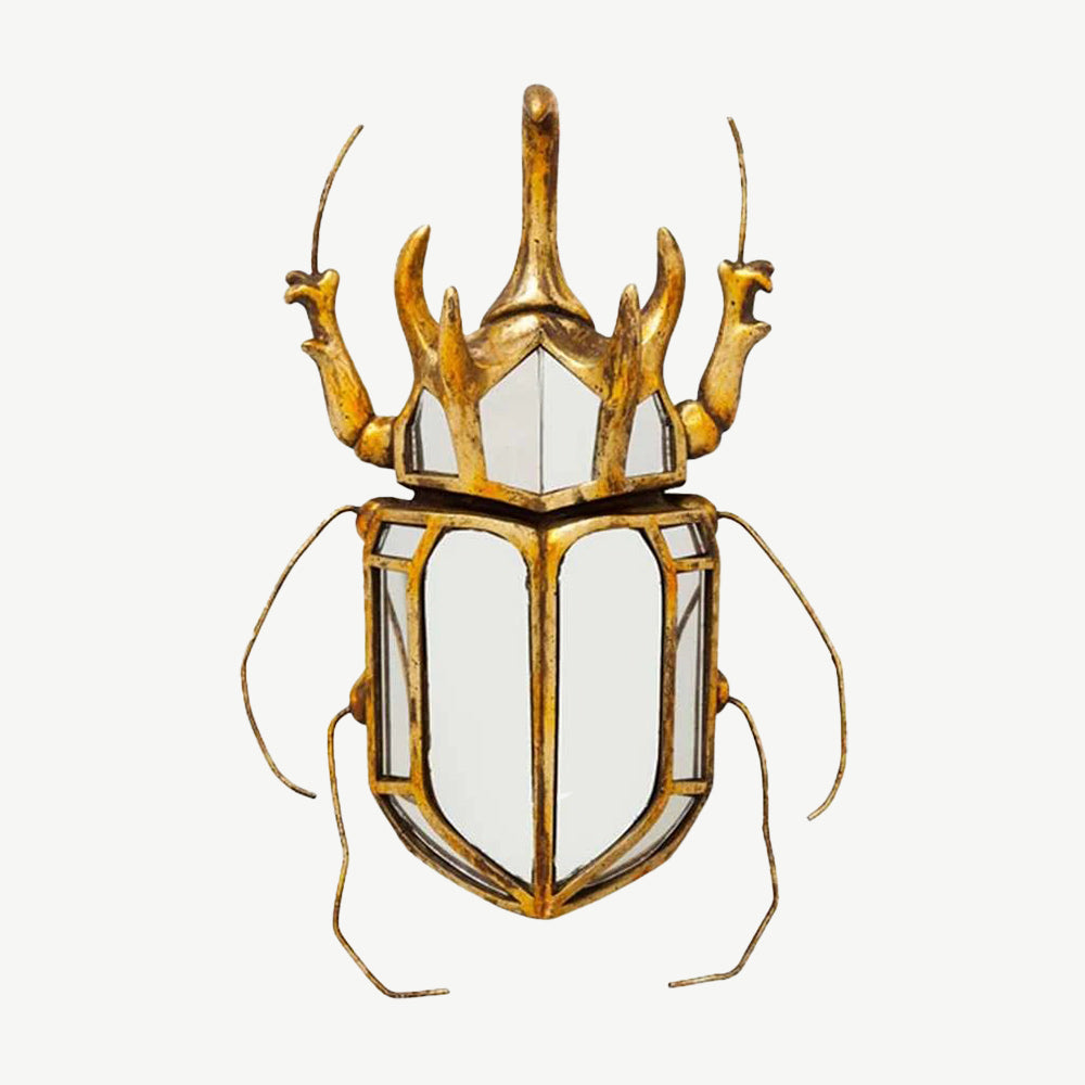 Sculptural beetle shaped wall mirror in gold aged metal finish

