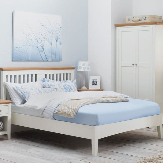 Two tone bedframe painted white with natural oak top