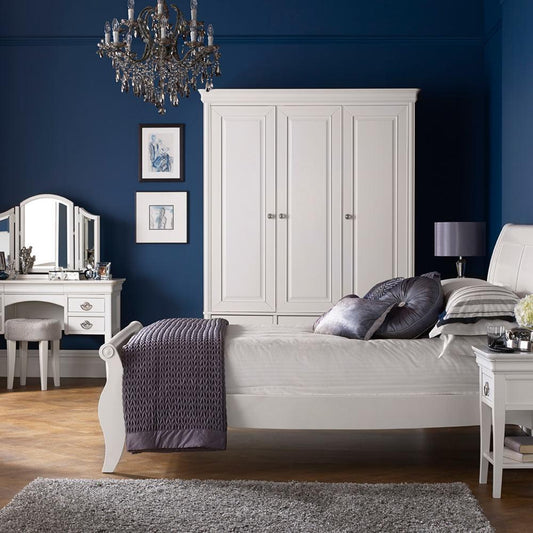 Wooden bedframe in painted white finish
